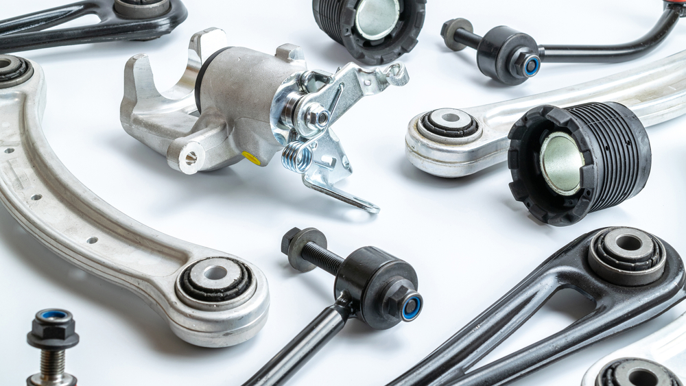 Random car parts on a white background